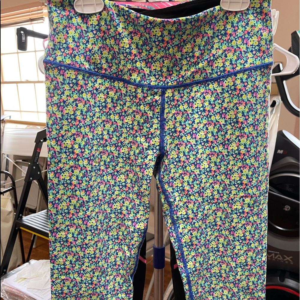 Victoria Secret spandex crop legging. Yellow Floral pattern with blue stitching